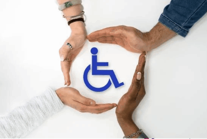 Disabled symbol with hands surrounding